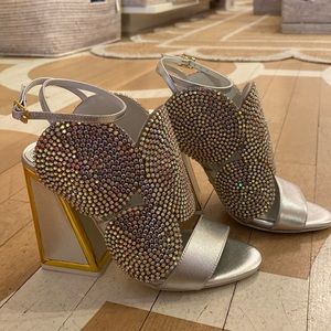 Super fun silver heels! Never been worn!